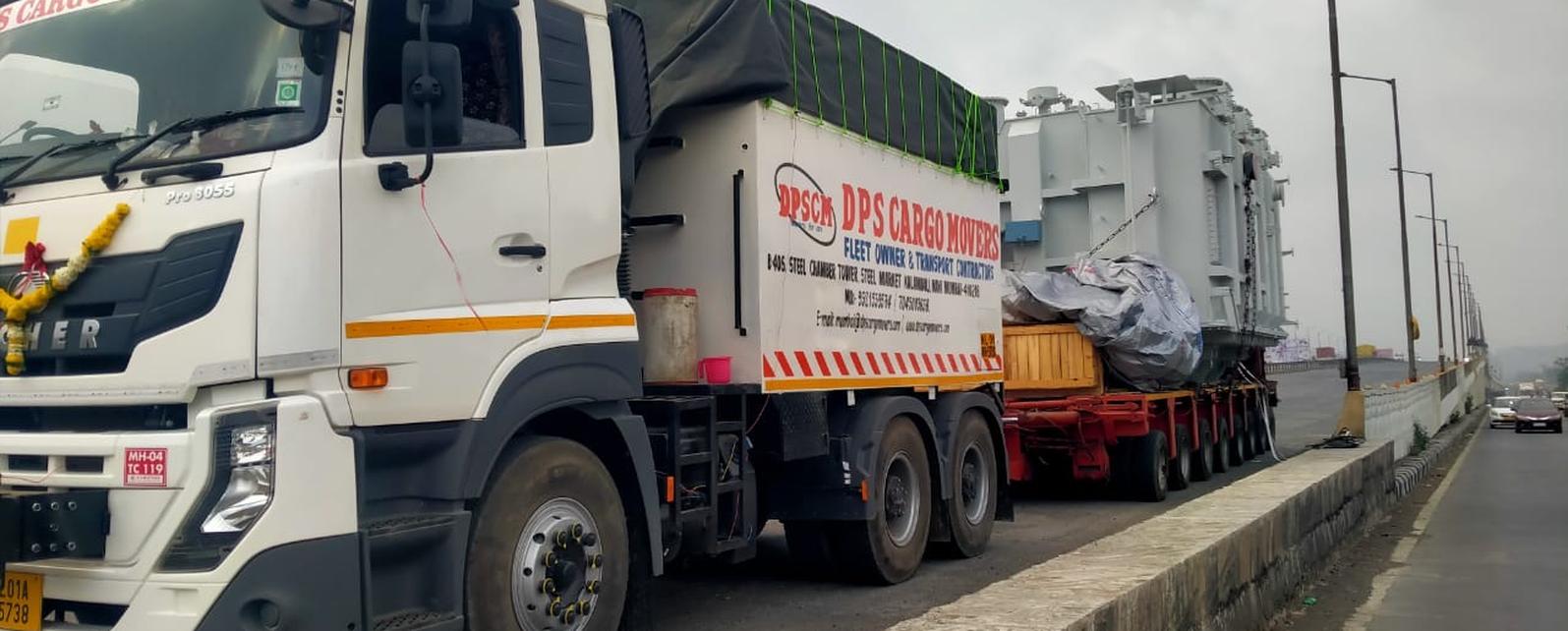 Wide load convoy in India